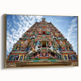 Framed canvas featuring a vintage-style landscape painting of a Malaysian scenery in black and gold tones.