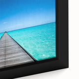 Black framed canvas featuring a textured, colorful Maldivian landscape, ideal for living room decor.