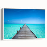 Vintage poster art of Maldivian scenery on framed canvas, featuring vibrant blues and greens, ideal for living room decor.