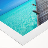 Art deco poster of a serene Maldives beach scene in pastel blue and green tones on rolled canvas.