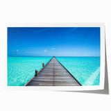 Extra large rolled print of Maldives scenery with vibrant blues and greens, ideal for dining room wall art.