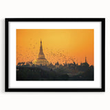 Extra large abstract art print of a vibrant, colorful Asian scenery on a textured canvas, framed in black.