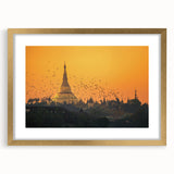 Extra large abstract art print of a textured Myanmar scenery in muted gold and earth tones, framed with a mat.