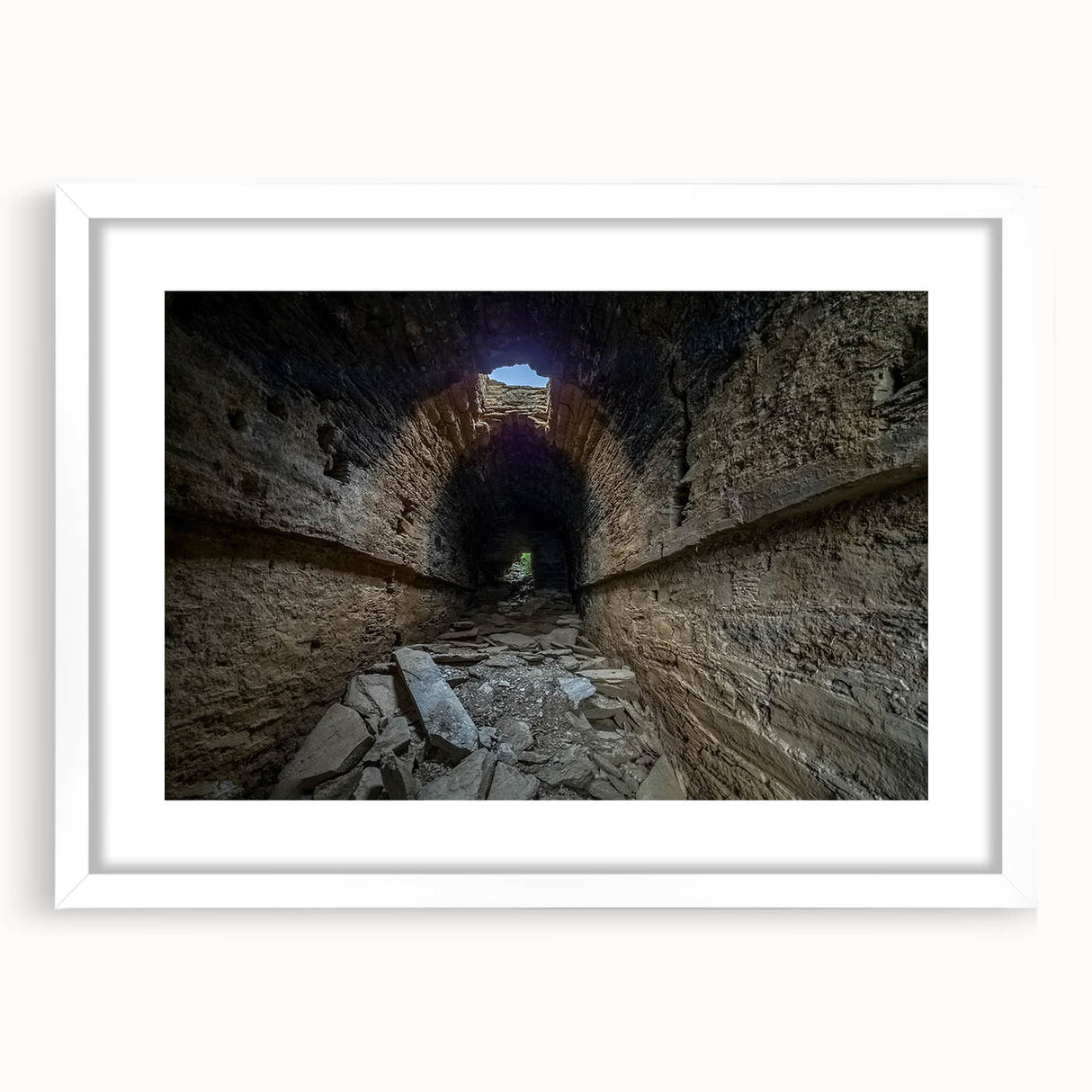 Abstract art print of a serene Pakistani landscape in muted earth tones on a white-framed canvas.