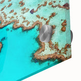 Large abstract depiction of the Great Barrier Reef in vibrant blue and green tones on acrylic glass.