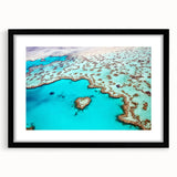 Extra large, textured abstract art print of the Great Barrier Reef in vibrant, colorful hues on a black framed canvas.