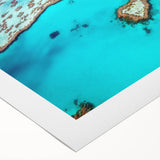 Art deco poster of the Great Barrier Reef in vibrant blue and green tones on rolled canvas, ideal for dining room wall decor.