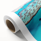 Art deco poster of the Great Barrier Reef on rolled canvas, showcasing vibrant marine colors, ideal for nursery wall art.