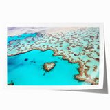 Extra large rolled print of the Great Barrier Reef in vibrant blues and greens, ideal for dining room wall art.