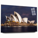 Large abstract wall art of Sydney skyline in muted blue and gray tones on acrylic glass.