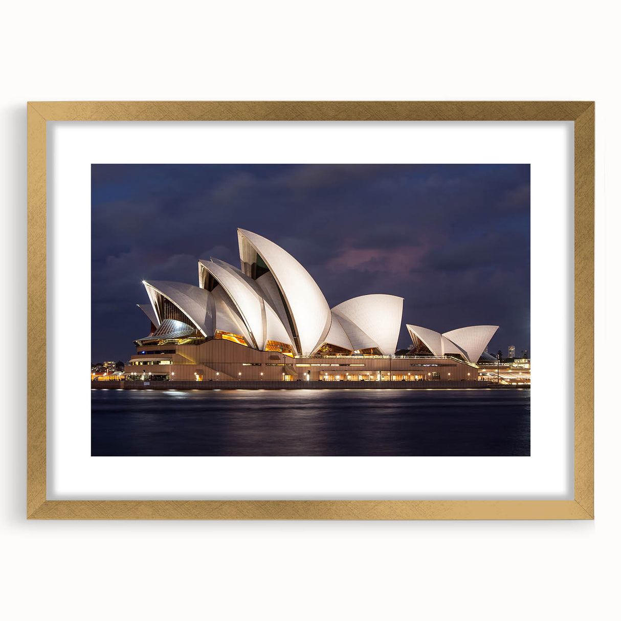 Abstract art print of Sydney skyline in muted blue and gold hues on a framed canvas, ideal for dining room decor.