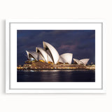 Textured abstract art print of Sydney skyline in muted blue and gray tones on a framed white canvas, ideal for bedroom art.
