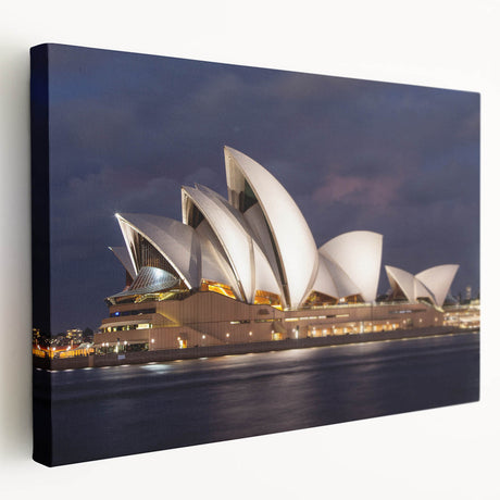 Side view of a large stretched canvas featuring a detailed Sydney skyline in muted blue and gray tones.