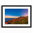 Abstract art print of colorful, textured scenery in Newfoundland, displayed in a large black frame with mat.