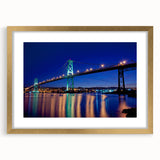 Extra large wall art featuring an abstract depiction of Nova Scotia scenery, in textured gold tones, framed with mat.