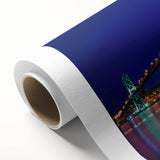 Art deco poster of Nova Scotia scenery on rolled canvas, with muted blue and green tones, ideal for nursery wall art.