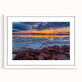 Abstract art print depicting a serene Prince Edward Island landscape in soft blue and green tones, framed with a white mat.