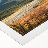 Art deco poster featuring a serene Saskatchewan landscape in muted earth tones on rolled canvas.