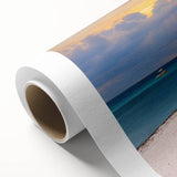 Art Deco style poster of a Caribbean scenery on rolled canvas, featuring pastel blue and pink tones.