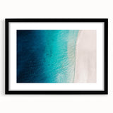 Extra large abstract art print of a Caribbean scenery in vibrant colors on textured canvas, framed in black.