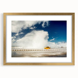 Abstract art print depicting vibrant Caribbean scenery in a gold frame, ideal for dining room decor.