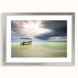Extra large wall art featuring abstract Caribbean scenery in vibrant blue and green tones, framed in silver.