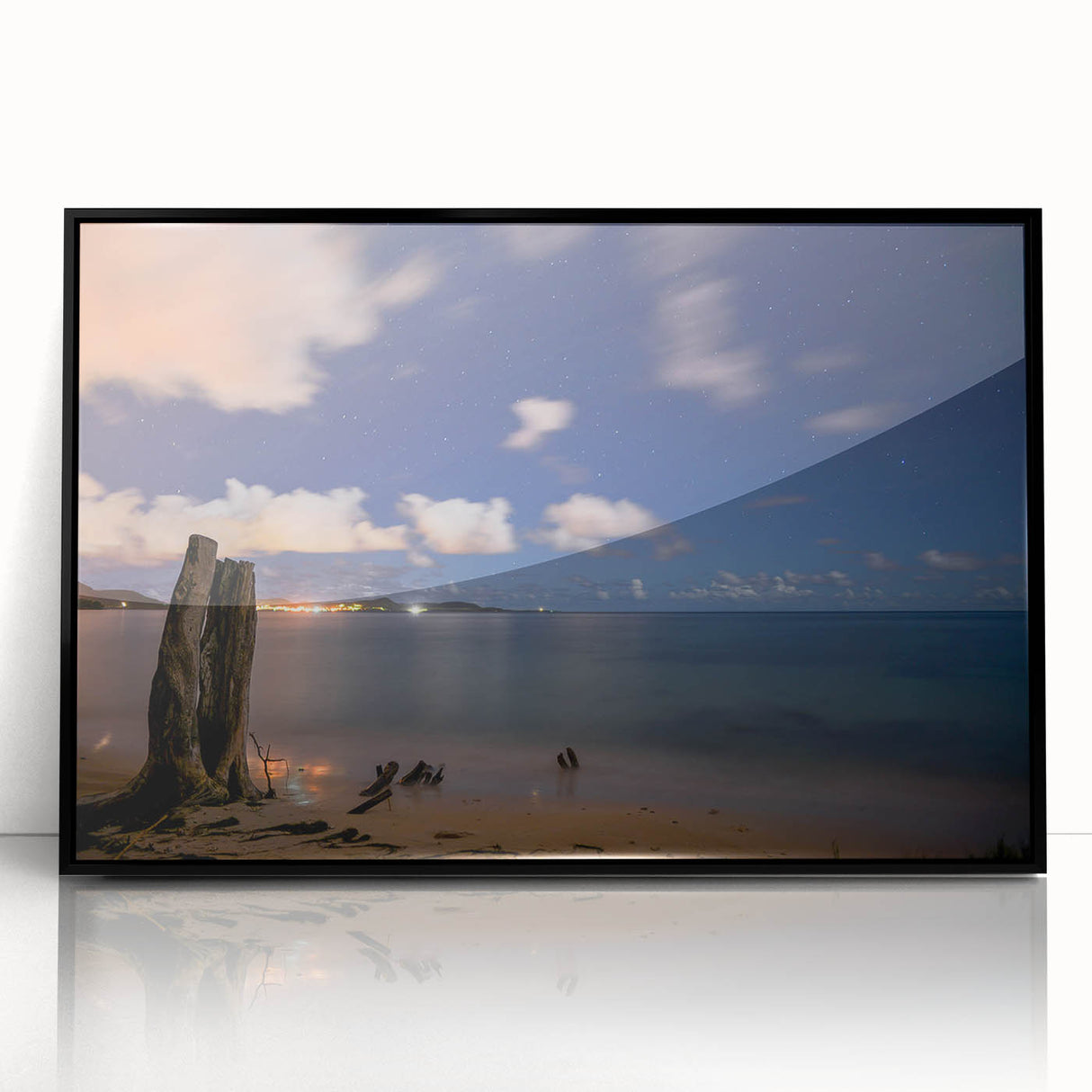 Large abstract wall art depicting a Caribbean scenery in muted greens and blues on a framed acrylic.