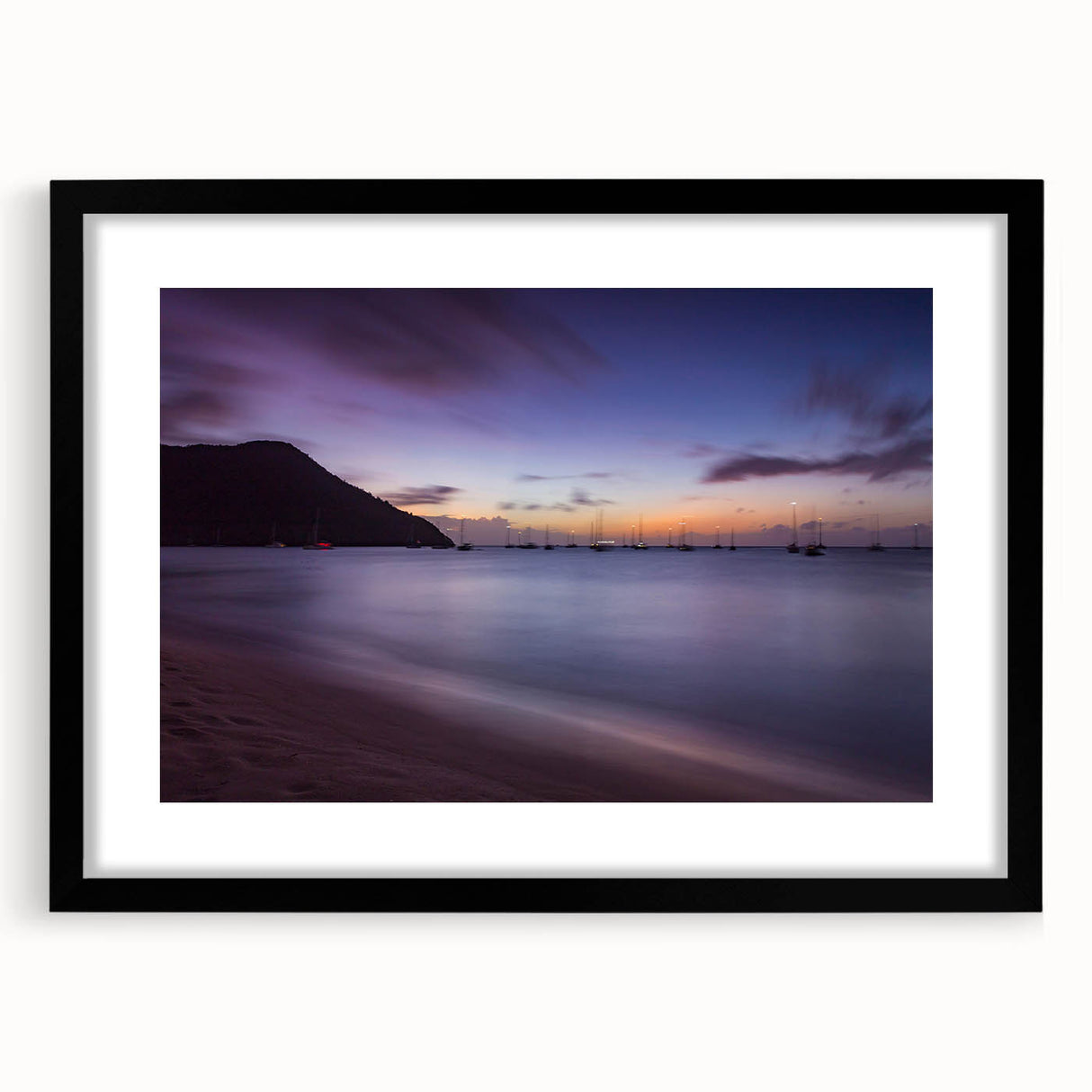 Extra large abstract art print depicting a colorful Caribbean scenery on textured canvas, framed in black.