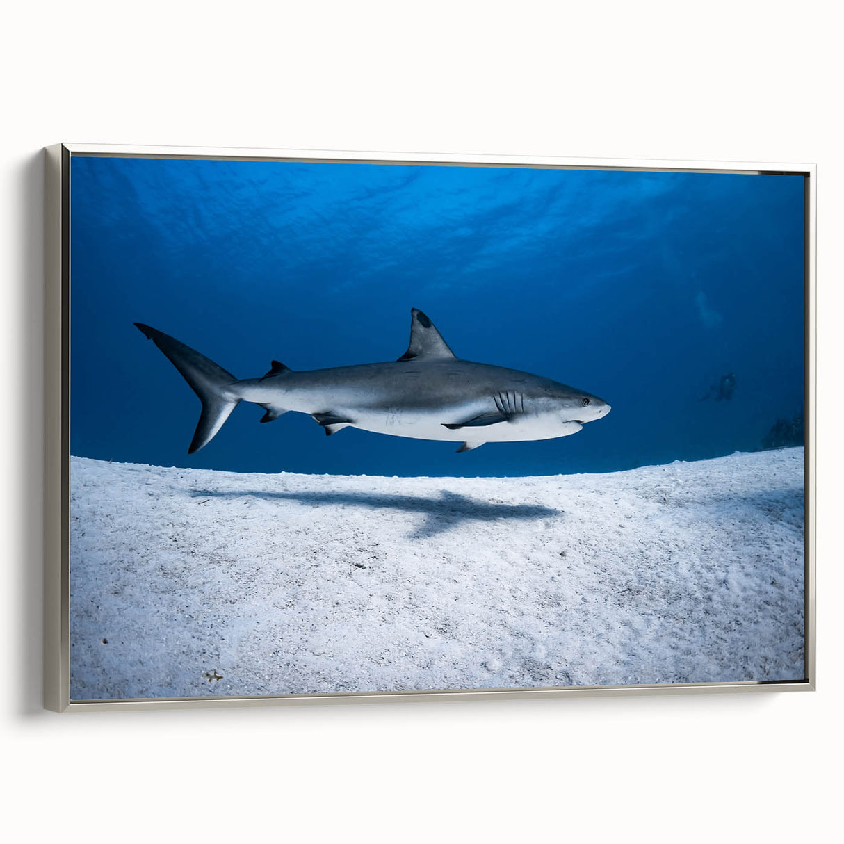Framed canvas depicting a vintage-style Caribbean landscape with vibrant blue and green tones.
