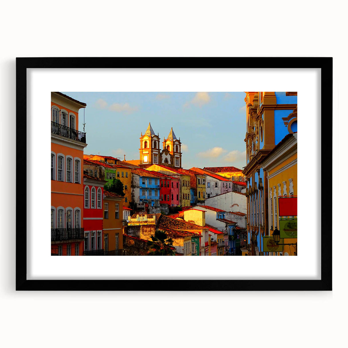 Extra large abstract art print of Central American scenery in vibrant colors on a textured canvas, framed in black.