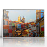 Art deco poster of a Central American landscape with vibrant greens and blues, framed in white acrylic.