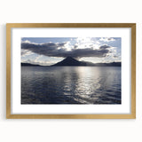 Extra large abstract art print depicting textured Central American scenery in muted earth tones, framed in gold.