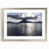 Textured abstract art print featuring a vibrant, multicolored depiction of a Guatemalan landscape, framed in silver.