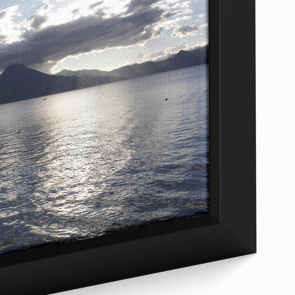 Framed canvas of a textured, colorful Central American landscape in black, ideal for living room decor.