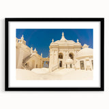 Colorful abstract art print of a Central American landscape, in a black frame with mat, ideal for living room decor.