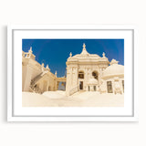 Abstract art print depicting a vibrant scene of Central America with bold colors on a white framed mat.