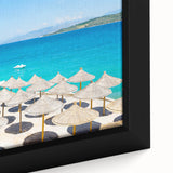 Close-up of black wall art featuring a textured, colorful European Albanian scenery on a framed canvas.