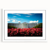 Textured abstract art print of a European landscape in muted earth tones on a white-framed canvas.