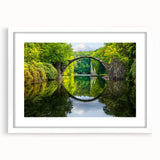 Textured art print of an abstract Bulgarian landscape in muted earth tones, framed with a white mat, ideal for bedroom decor.