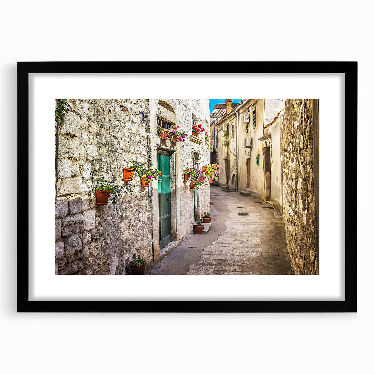 Extra large abstract art print of colorful, textured European scenery on a framed black mat, ideal for living room decor.