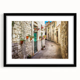 Extra large abstract art print of colorful, textured European scenery on a framed black mat, ideal for living room decor.