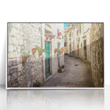 Mid-century modernist art depicting a Croatian landscape in muted earth tones on a framed acrylic.