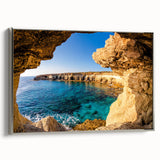 Framed canvas depicting a vintage-style landscape painting of Cyprus, featuring vibrant colors against a black background.