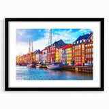 Extra large abstract art print of colorful European scenery on textured canvas, framed in black, ideal for living room decor.