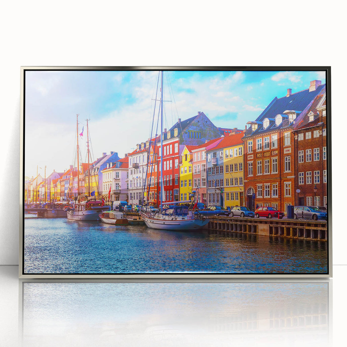 Large art print of a Danish landscape in muted green and blue tones on a framed acrylic.