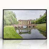 Large abstract wall art depicting a European scenery in muted earth tones on a framed acrylic.