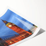 Extra large wall art featuring line art flowers and Big Ben in muted earth tones on a rolled canvas.