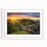 Textured art print of an abstract Cumbria landscape in muted earth tones on a framed white mat, ideal for bedroom decor.