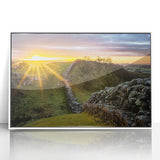 Mid-century modernist art depicting the serene Cumbrian landscape in muted greens and blues on a framed acrylic print.