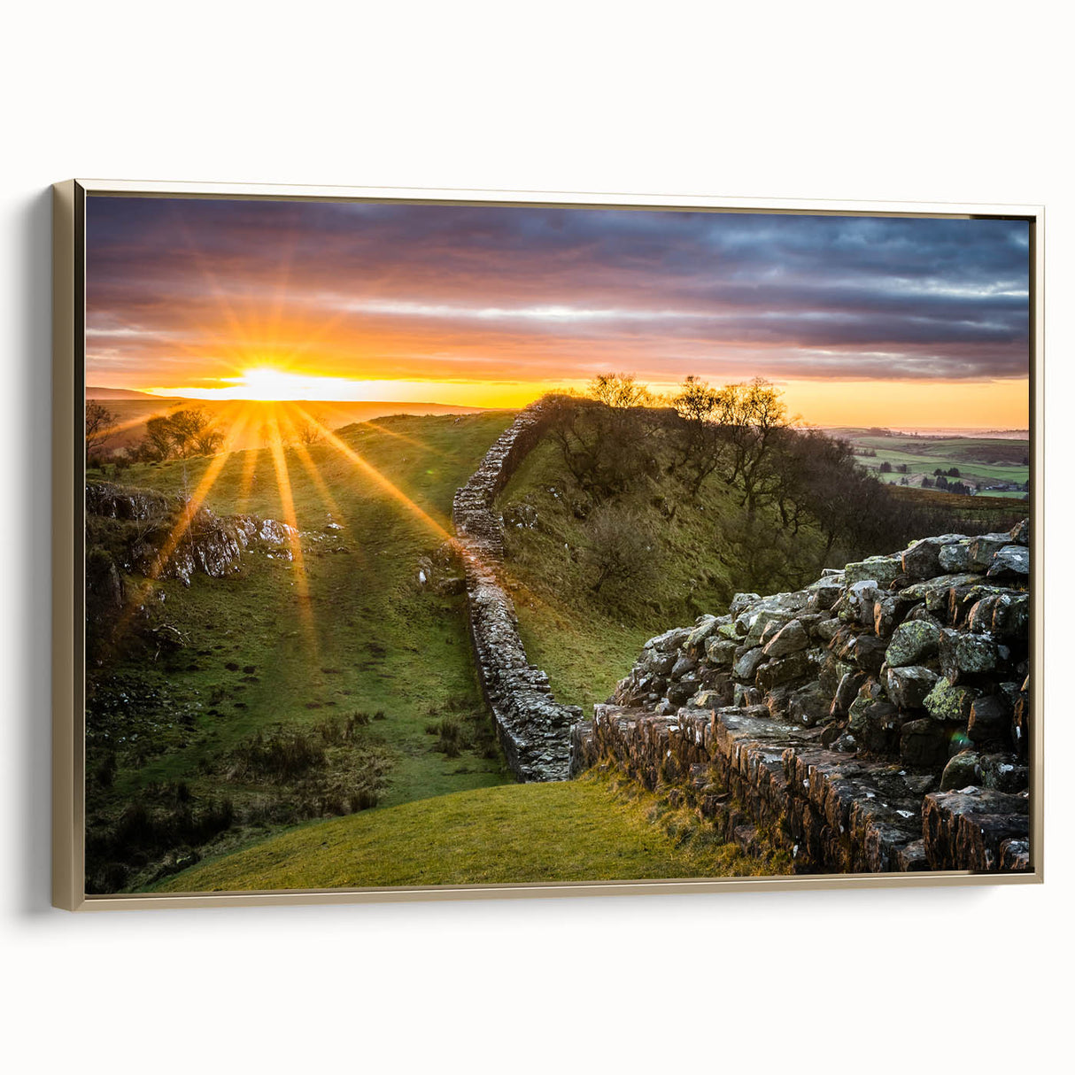 Framed canvas depicting a vintage-style landscape painting of Cumbria, England, in muted earth tones.
